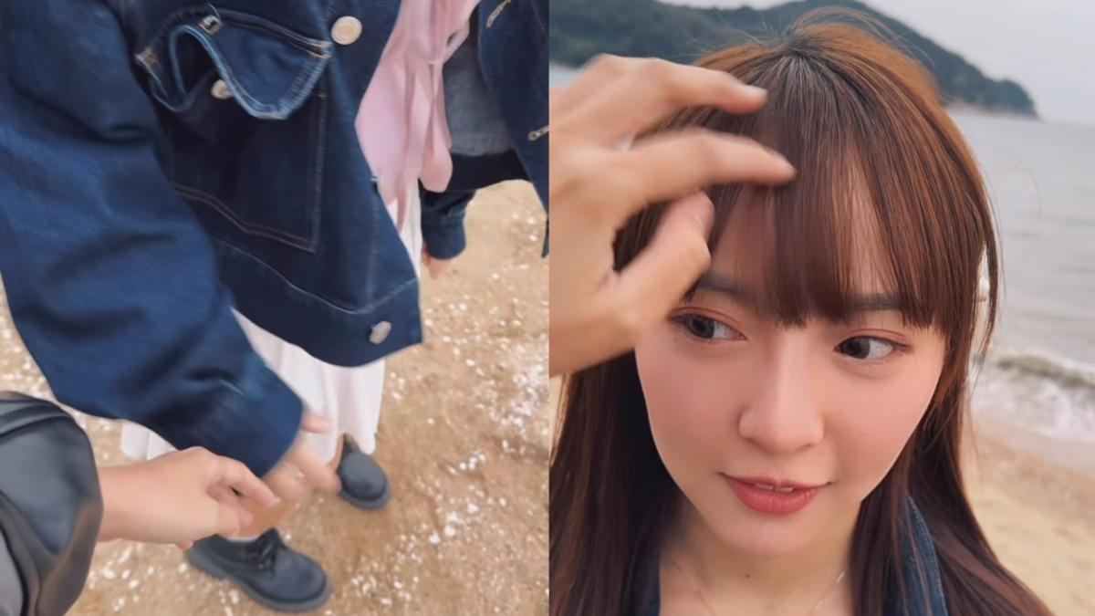 陳詩媛沙灘上被摸頭,還和掌鏡人若有似無地碰了碰手。(圖/翻攝自陳詩媛IG)