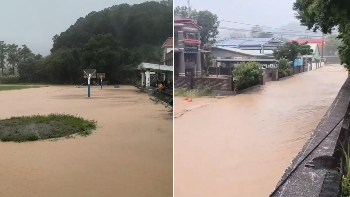 花蓮卓溪國小操場被淹沒，圍牆外馬路也淹大水。（圖／翻攝畫面）