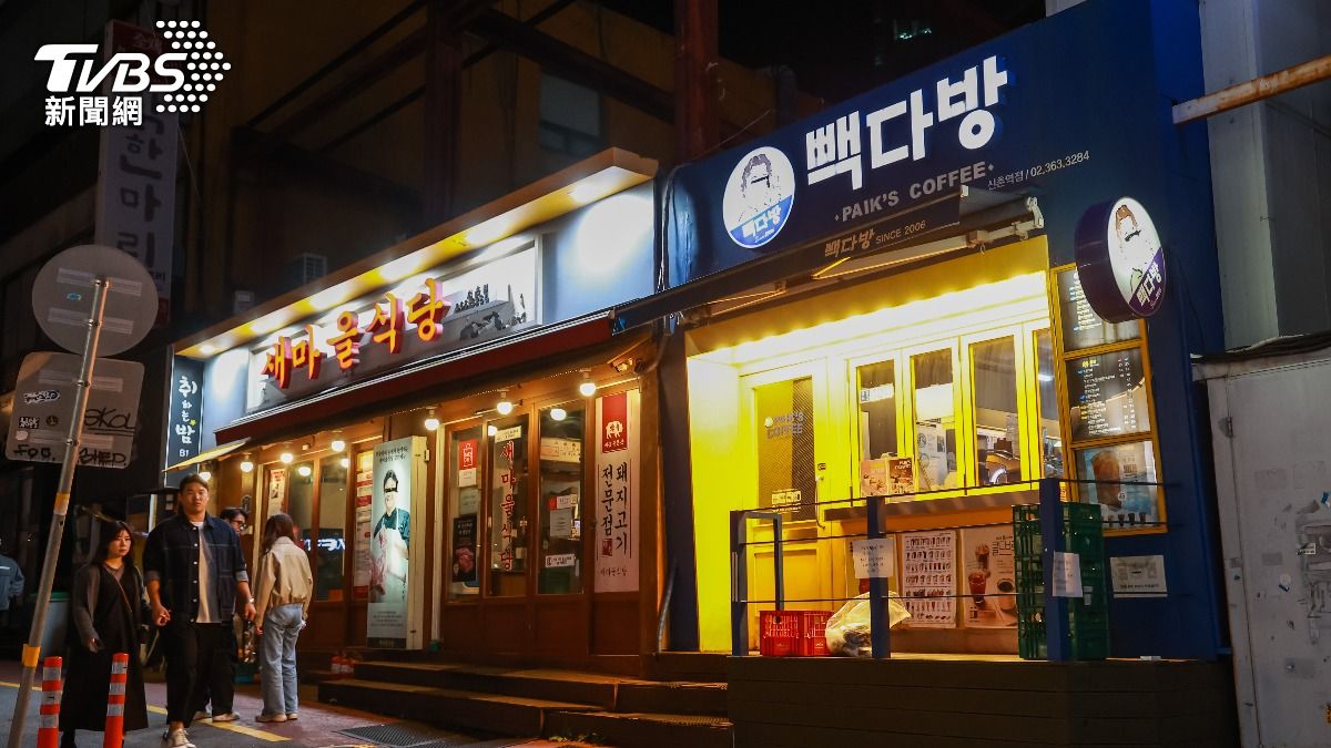 首爾街頭經常能看到白種元的餐廳比鄰經營,左為新村食堂、右為白茶房。(圖/趙世平攝)