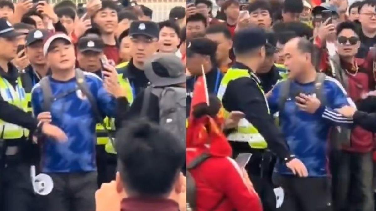 男穿日本足球隊球衣遭包圍嗆「漢奸」 中國警察拉角落強行脫衣