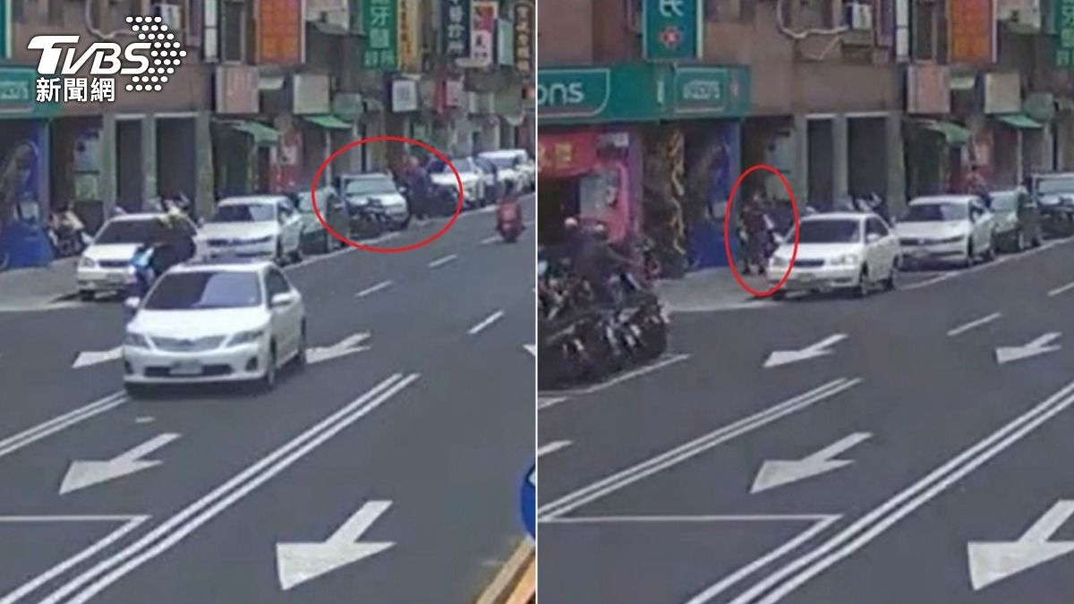 監視器拍下雙方因違規停車發生爭執，2人當街爆發拉扯。（圖／TVBS）