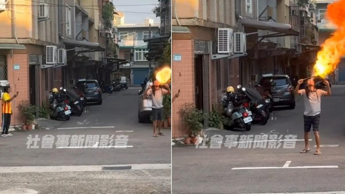 非洲籍街頭藝人當街上演噴火秀。（圖／社會事新聞影音）