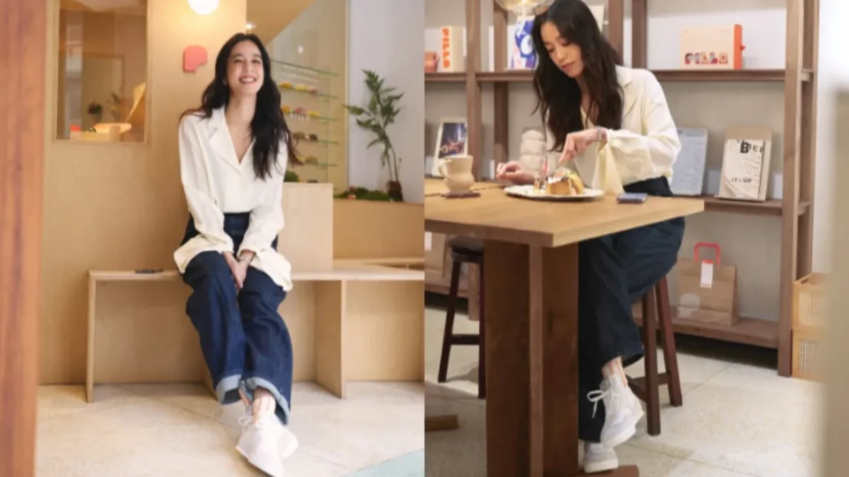 陳庭妮穿著V領絲質上衣，搭配高腰牛仔褲。（圖／Chloe提供）