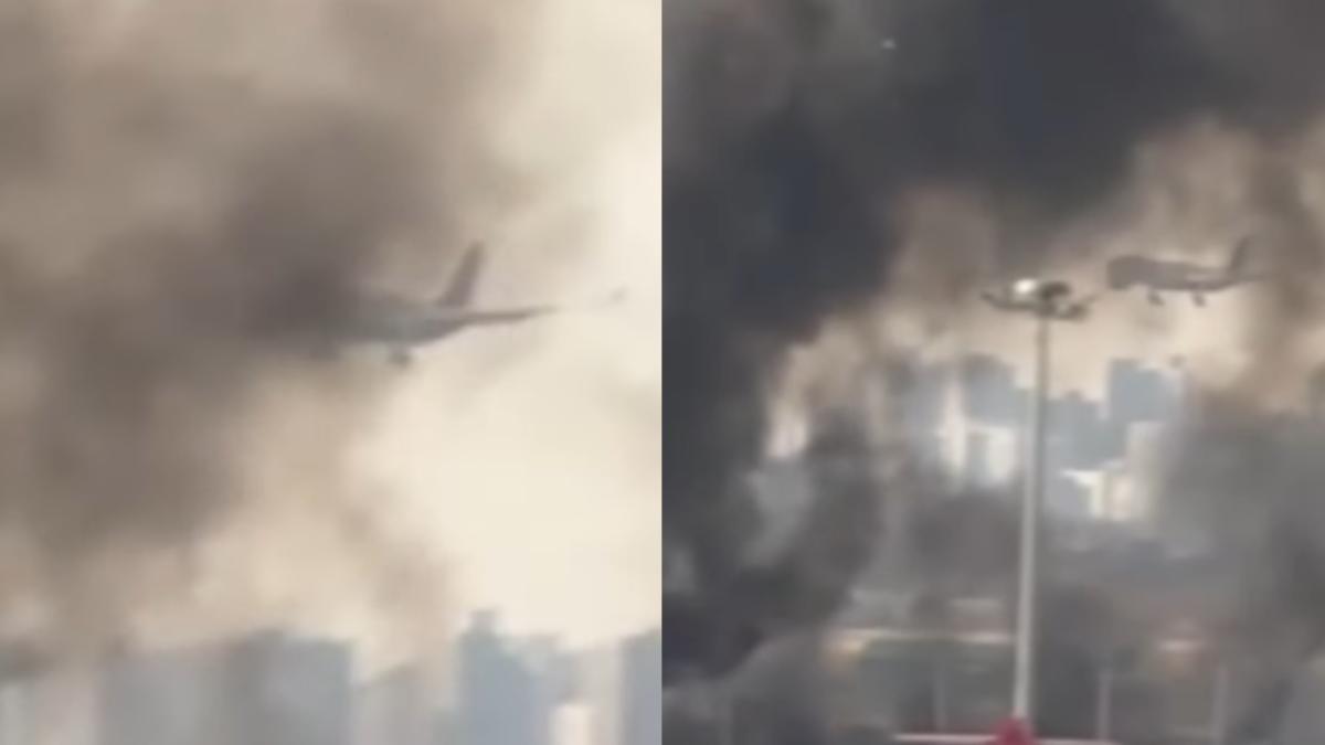 金浦機場濃濃黑煙不斷竄出，客機仍冒險起降。（圖／翻攝自YTN YouTube）