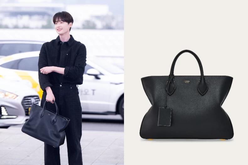李鐘碩手上的包包正是FERRAGAMO標誌性的黑色托特包。(圖/FERRAGAMO提供)