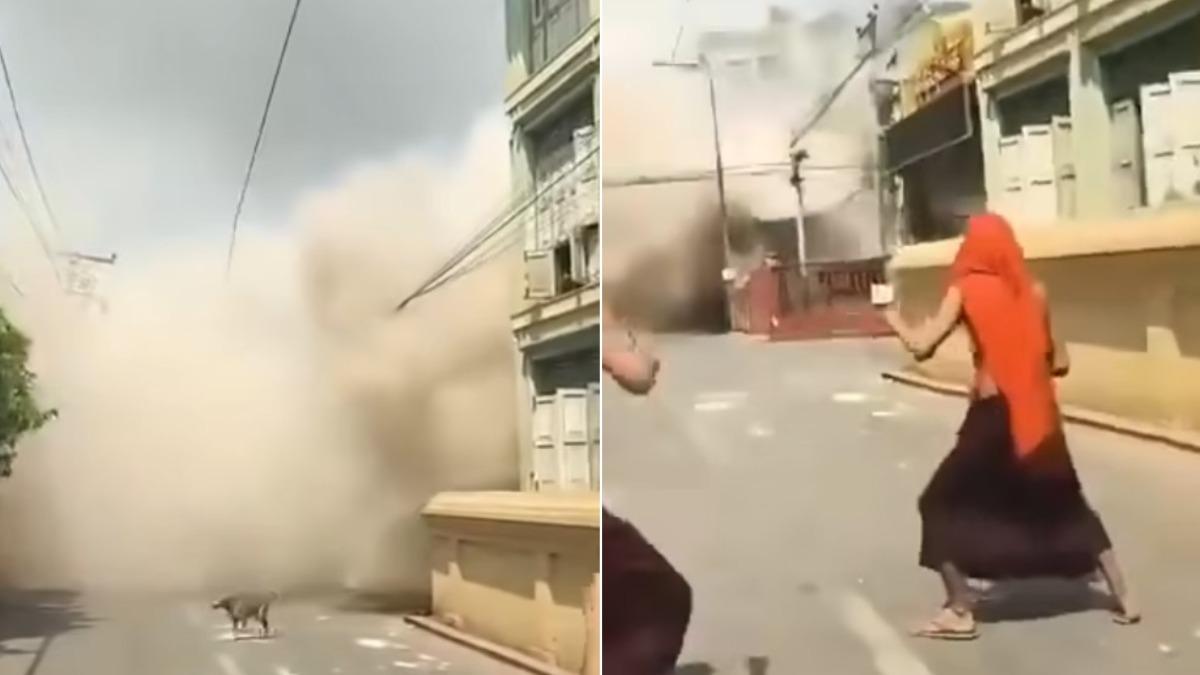 隨著建築坍塌,冒出的粉塵也逐漸將街道淹沒,嚇得僧侶逃跑。(圖/翻攝自Facebook@Khaosod - ข่าวสด)