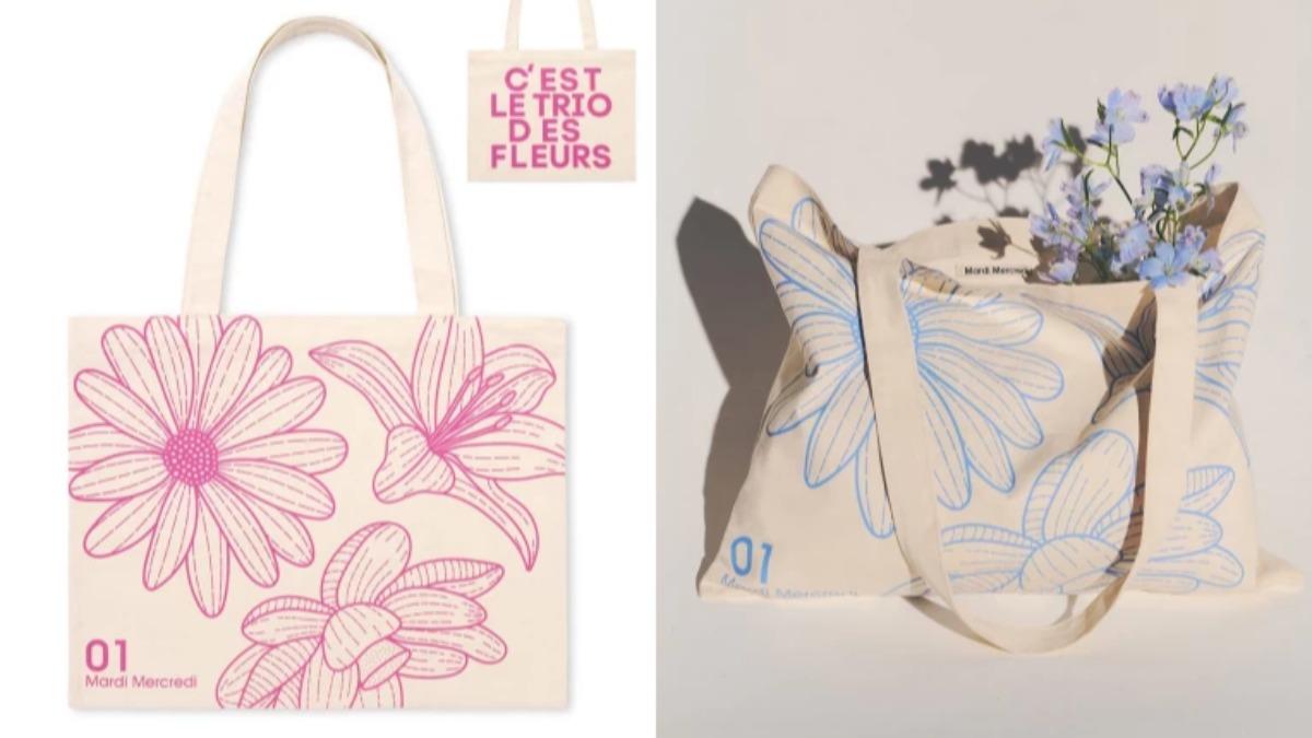 這款帆布袋另一面是英文字標語「C'EST LE TRIO DES FLEURS」寫著這是三朵花。(圖/Mardi Mercredi官方)
