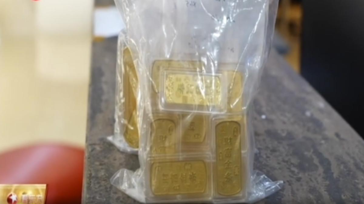 有大盤商把現有的金條全掃光，豪砸680萬新台幣不手軟。（圖／上海東方衛視）