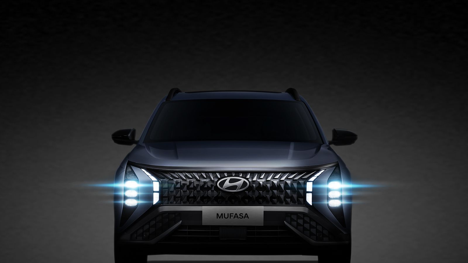 車頭的直列式LED頭燈與車側的迴力鏢型折線相互呼應。（圖／HYUNDAI提供）