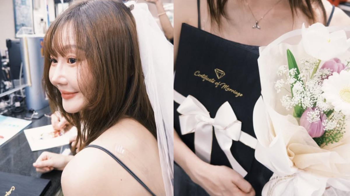 朱朱手捧鮮花和結婚證書。(圖/翻攝自piglet_lu IG)