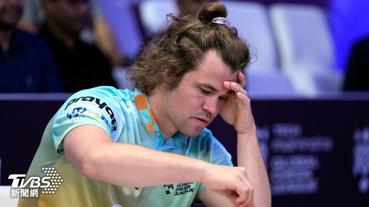 挪威棋王卡爾森（Magnus Carlsen）網路單挑14萬3000人。(圖／達志影像美聯社)