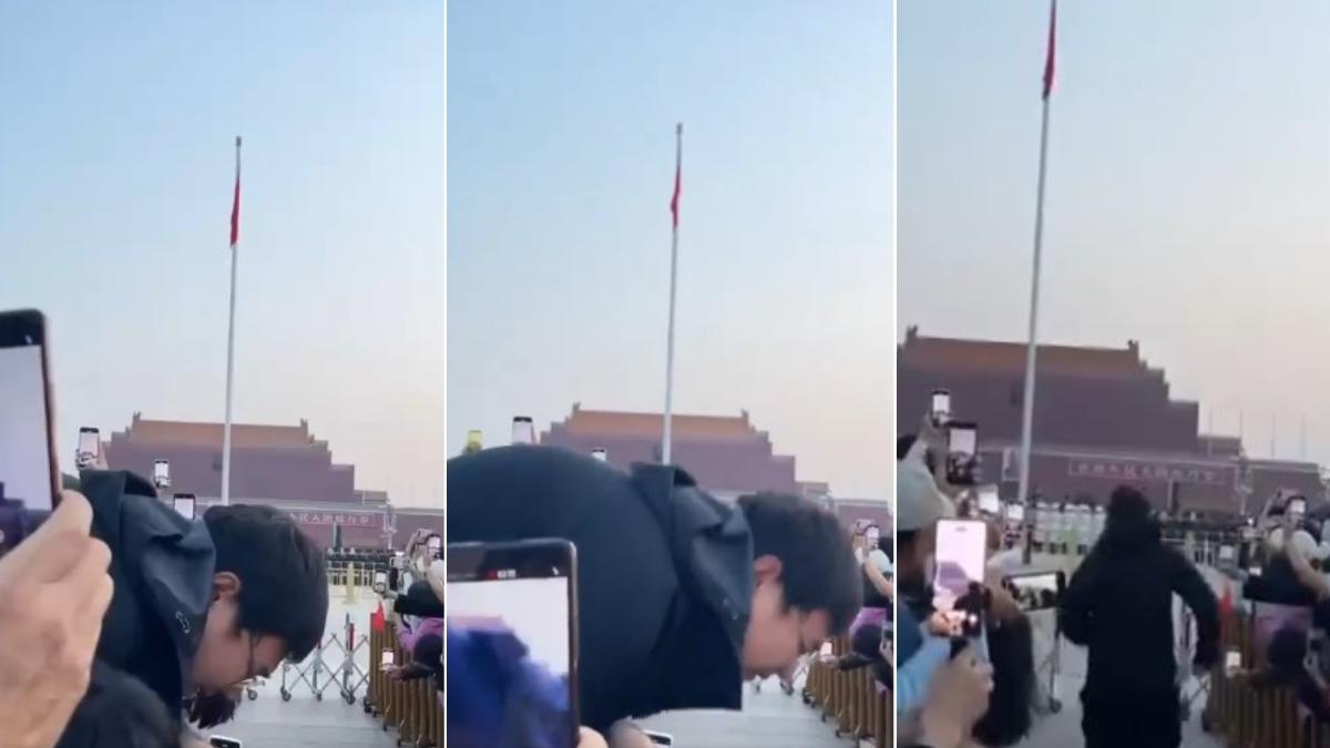 1名黑衣男子突然跨越欄杆、試圖衝向國旗。（圖／翻攝自X@whyyoutouzhele）