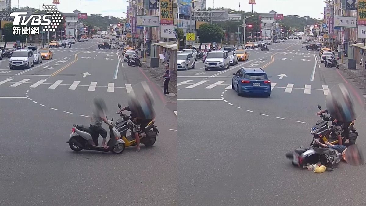 婦人對罷免志工比倒讚,未注意來車發生擦撞。(圖/TVBS)