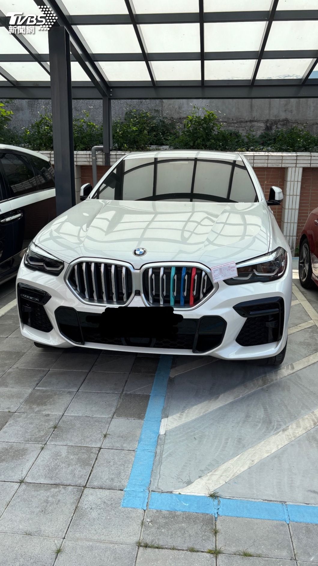 警方查扣犯罪集團的BMW轎車。