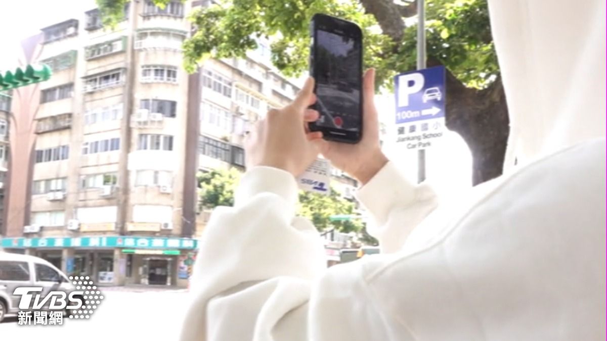 民眾拍攝街景遭檢舉。(圖/TVBS)
