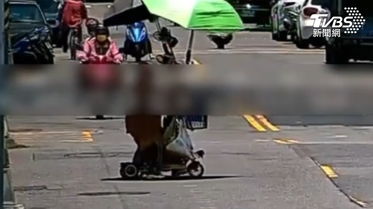 艷陽高照,高雄一名出家師父改裝電動滑板車,加裝2把雨傘遮陽。(圖/TVBS)