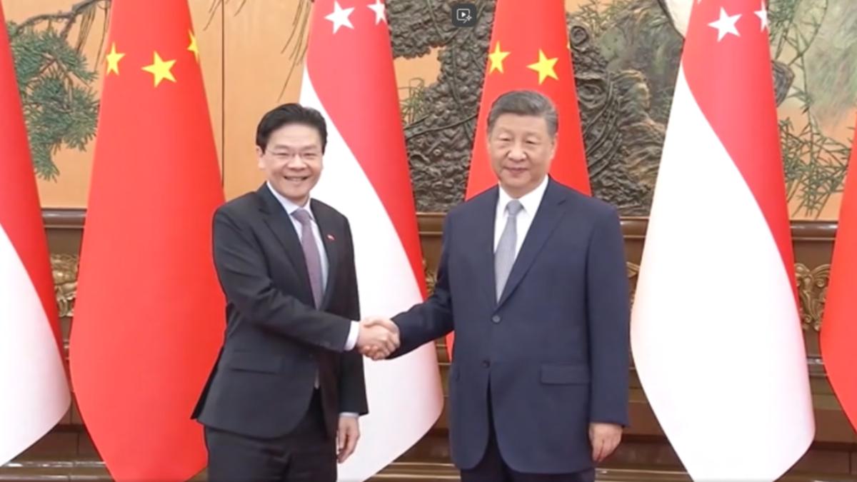 黃循財於24日上午在北京人民大會堂與習近平會面。（圖／CCTV+）