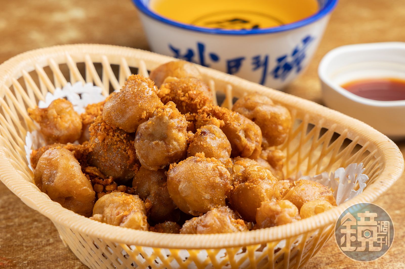 彈牙脆口的「椒鹽八爪魚咀」是店內牆上力薦的必點小食。(港幣85元/份,約NT$328)(圖/鏡週刊)