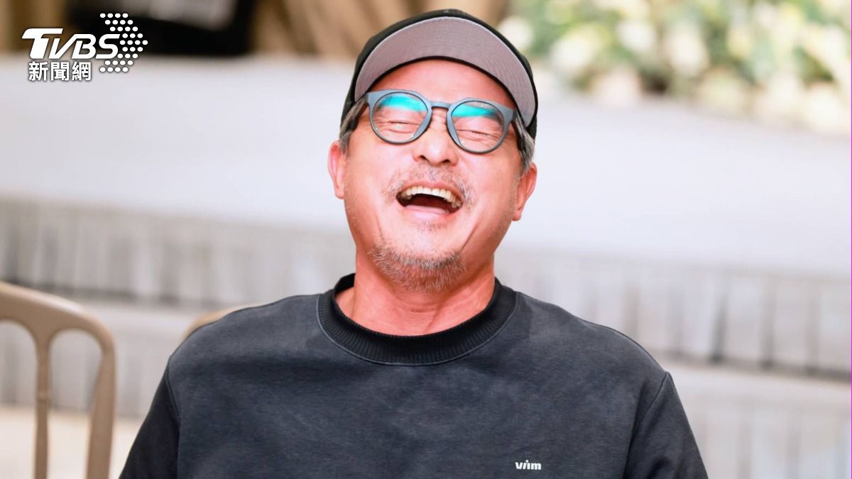 李銘順講到激動處大笑。(圖/趙世平攝)