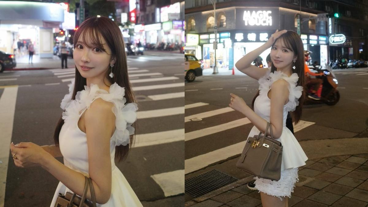 三上悠亞站在街角取景時,被後方正在等紅綠燈的機車騎士群認出,,忍不住緊盯著她看。(圖/翻攝自三上悠亞IG)