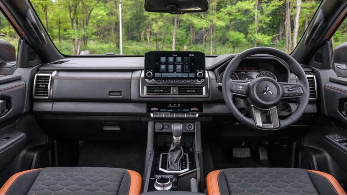 內裝一改傳統商用皮卡的陽春風格。(圖/Mitsubishi提供)