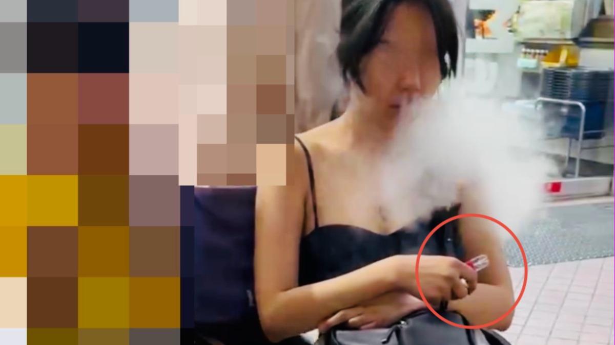 台南低胸女倒路中警上前關心 她竟掏「喪屍菸彈」吞雲吐霧