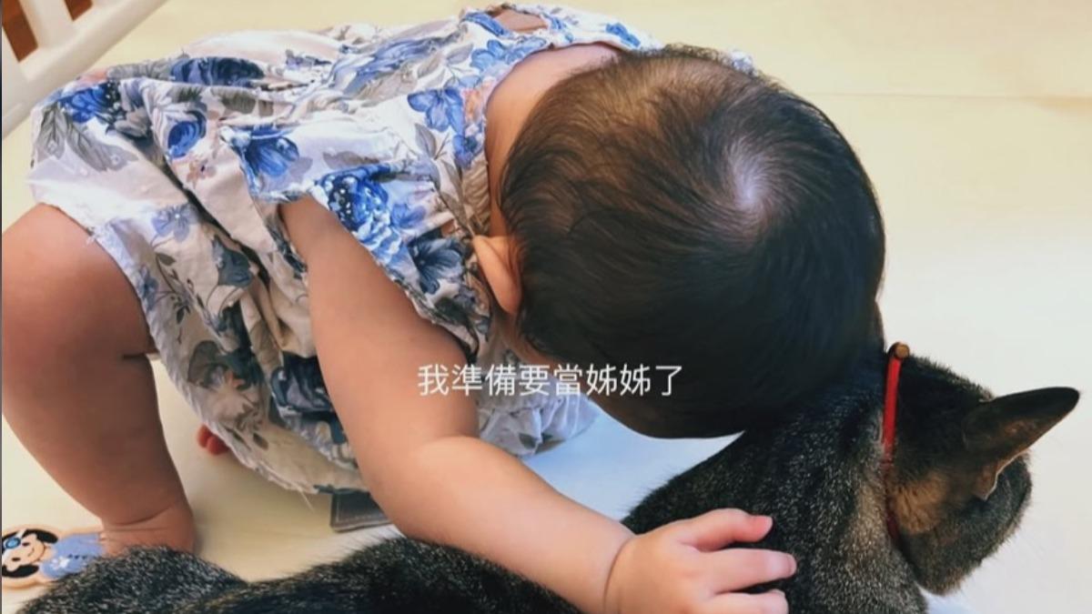 芮德曬出女兒萌照,嗨喊女兒要當姊姊了。(圖/翻攝自芮德IG)