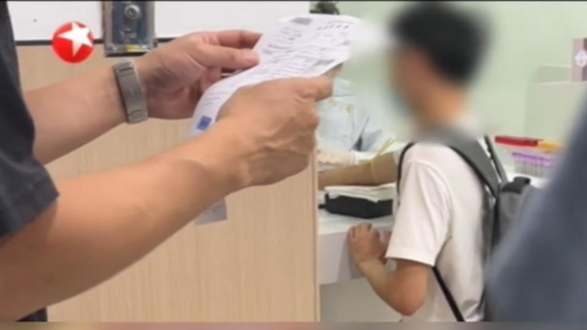 大陸出現「體檢替身」集團,專幫體檢驗不過的民眾鑽漏洞。(圖/上海東方衛視)