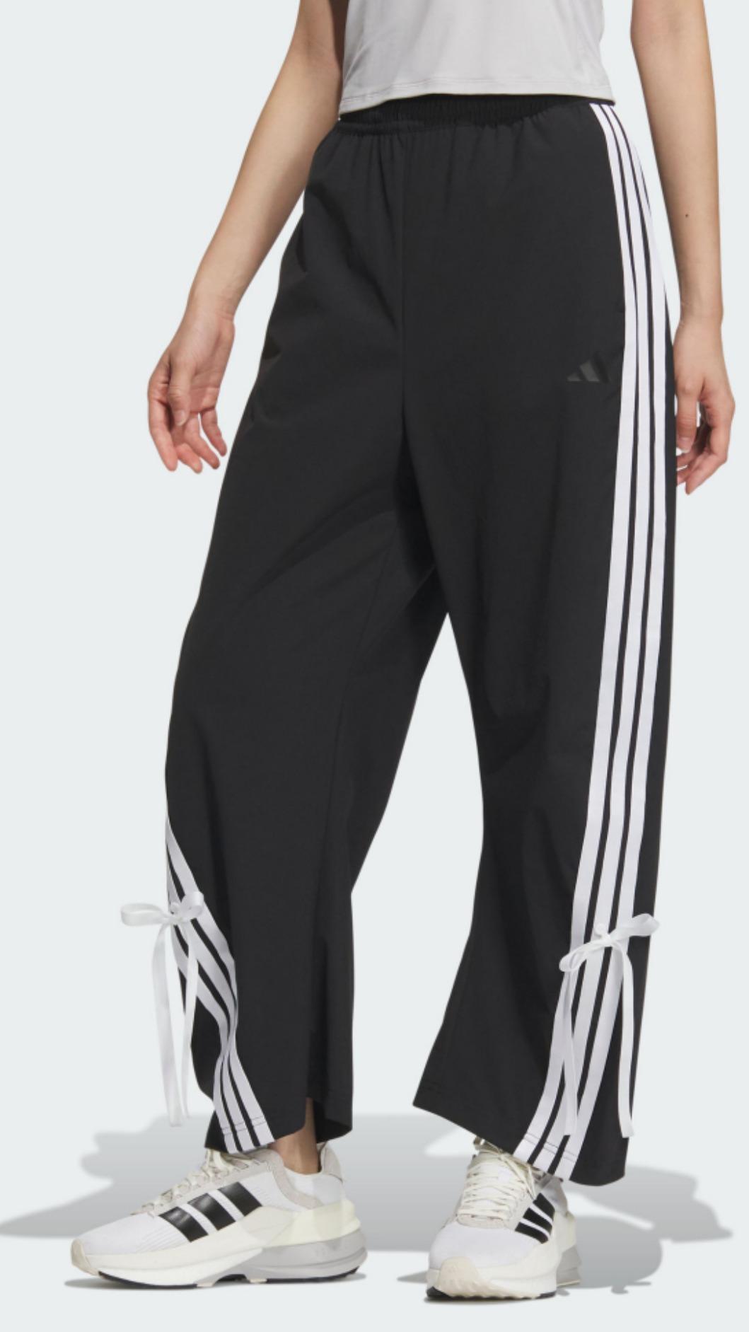 adidas 三線錐形褲,NT.2,690。(圖/翻攝自adidas 官網)