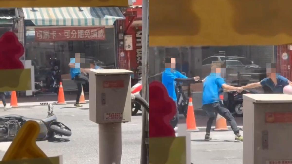 兩名男子互毆,4歲女童則被女子抱起。(圖/民眾提供)