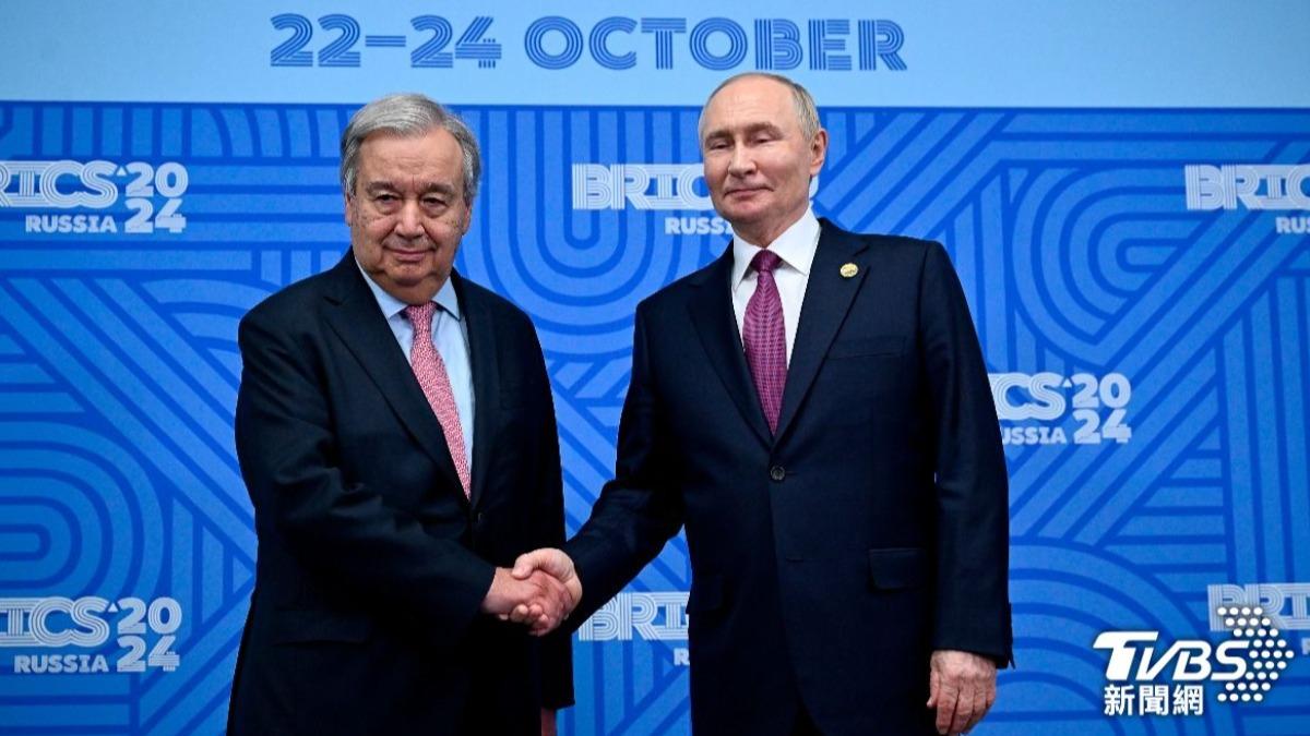 普欽與聯合國秘書長古特雷斯(Antonio Guterres)(左)。(資料照/達志影像美聯社)