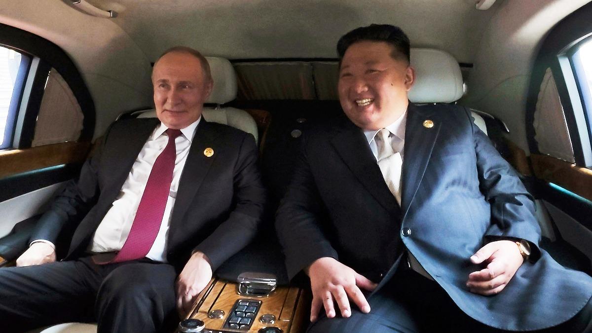 北韓官媒公布金正恩訪中50分鐘全紀錄，有不少他跟普欽的漏網鏡頭。（圖／達志影像美聯社）