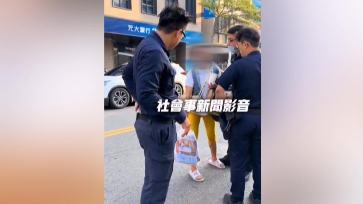 女消費者只想買「一顆」果乾，被業者婉拒後，沒想到消費者竟然暴走，狂罵攤商和員警是「矮冬瓜」（圖／翻攝社會事影音）