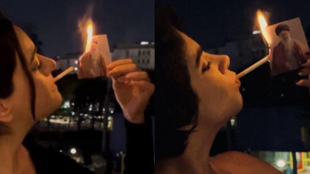 伊朗女性抗爭無懼槍口,摘下投巾、點菸焚燒哈米尼照片,展現爭取自由的態度。(圖/翻攝 X @MilitanTosh)