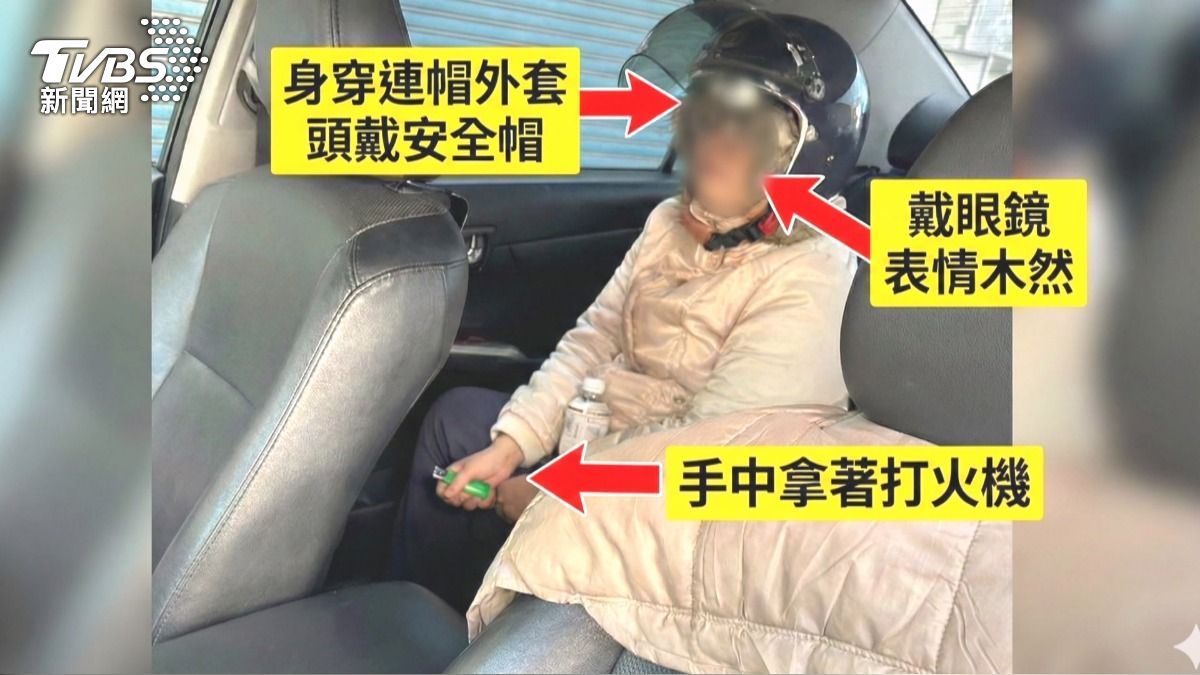 她購物完上車「後座多一人」！安全帽婦手持打火機不肯走。(圖／TVBS)