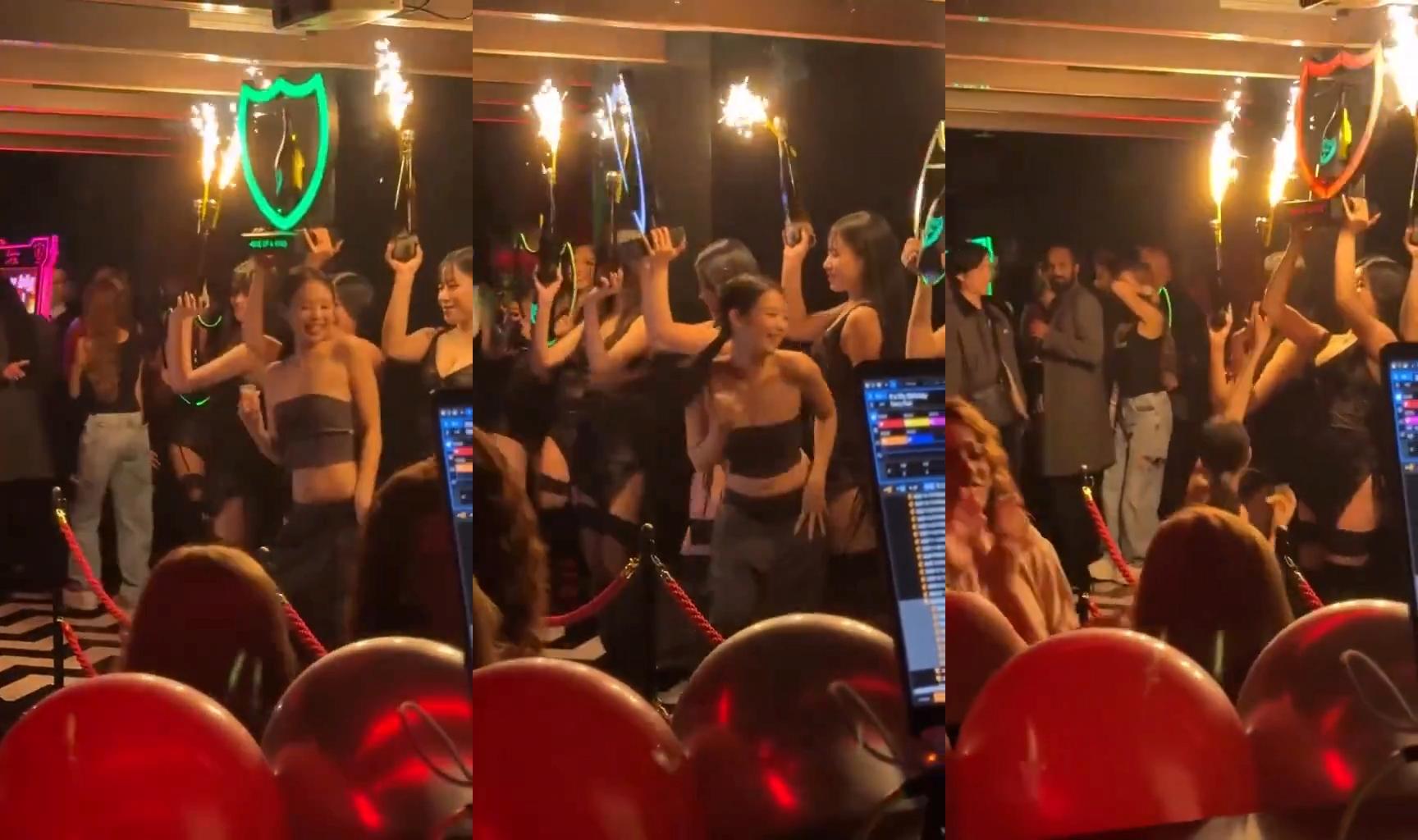Jennie背後的香檳女孩拿起噴火裝置舞動,她也貼上去熱舞。(圖/翻攝自推特)
