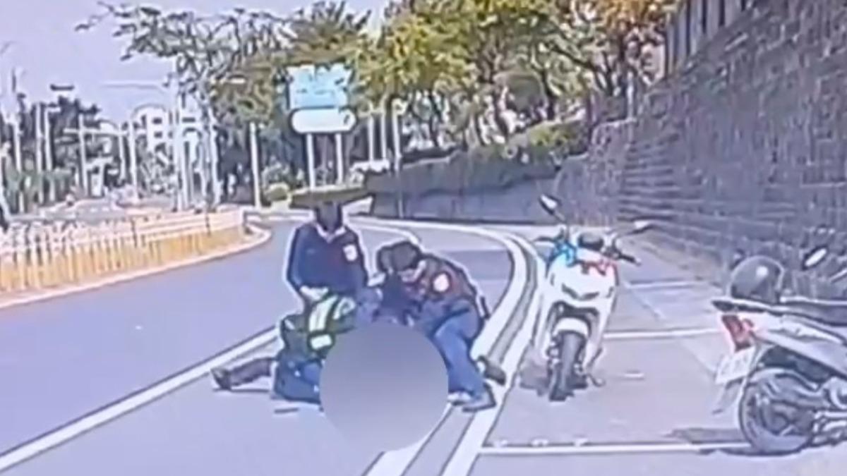 汪男在壓制過程中竟咬警反抗。（圖／TVBS）