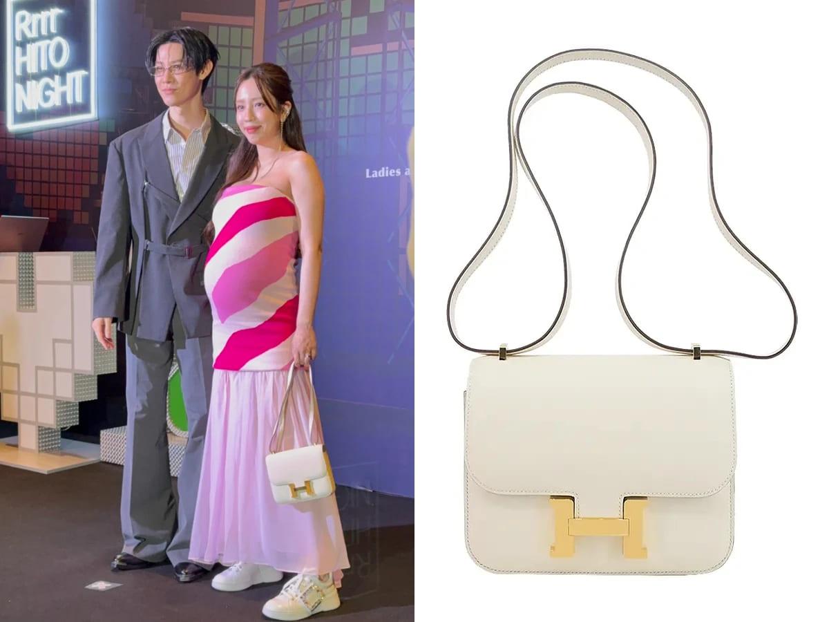 愛雅穿上粉紅色條紋漸層平口禮服、Roger Vivier小白鞋,手上是愛馬仕的 白色拚金扣的Constance包。(圖/女大編輯部)