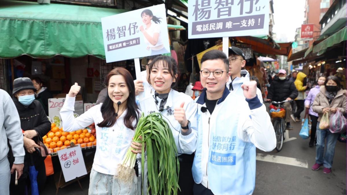 楊智伃、凌濤前往吳興市場掃街,遇到立委徐巧芯。(圖/翻攝凌濤臉書)