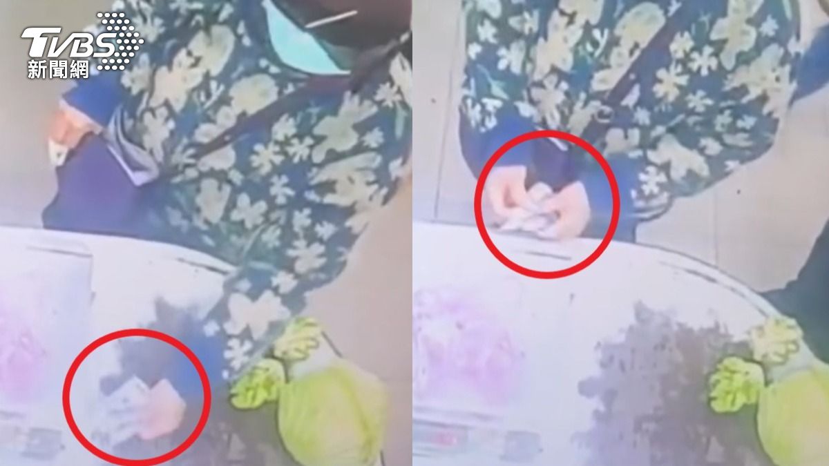 婦人買菜付千元鈔票,又放回皮夾。(圖/TVBS)