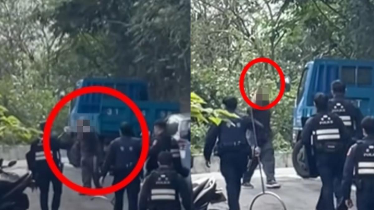 一名男子情緒激動，手持鐮刀揮舞。（圖／翻攝自桃園大小事臉書）