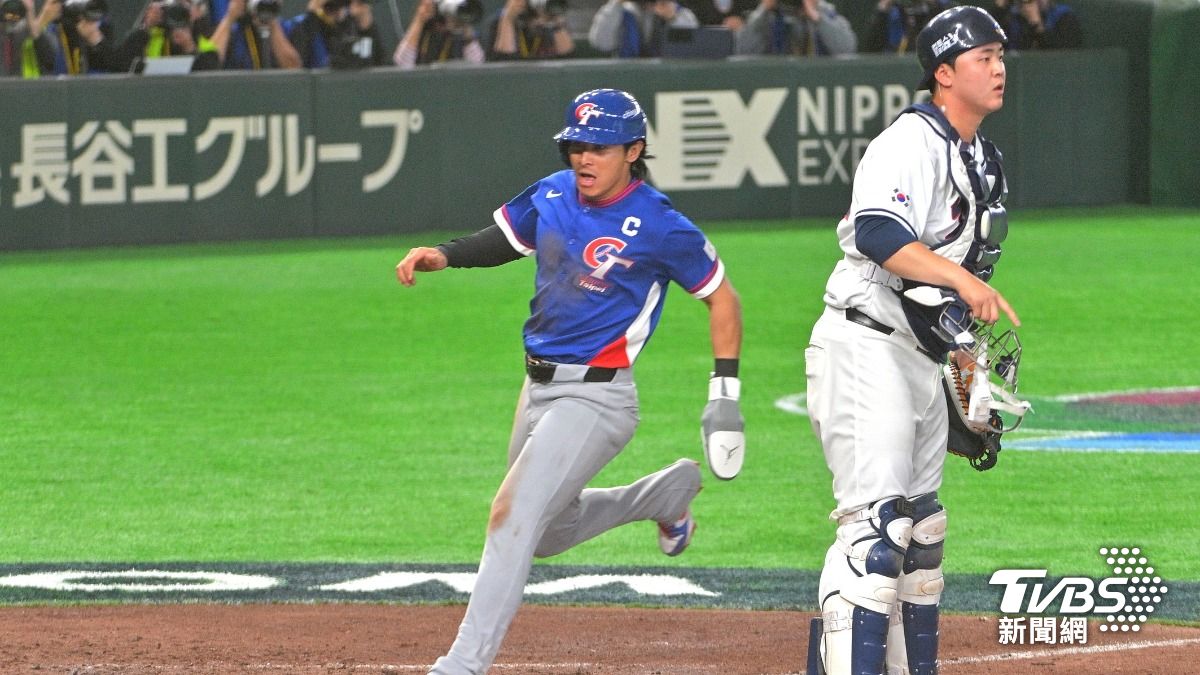 陳傑憲帶傷跑回致勝分。(圖／胡瑞麒攝)
