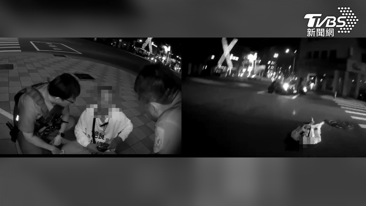 高雄市一名男子,21日深夜因行人闖紅燈遭開單,不滿警方深夜執法,到附近派出所靜坐絕食抗議,隨後更衝上馬路躺臥車道中央(圖/TVBS)