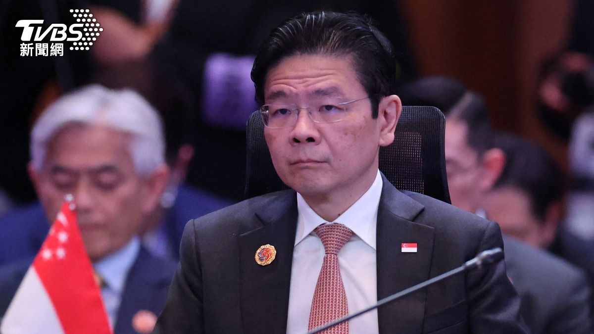 新加坡總理黃循財在勞動節集會唸中東撤僑航班一名乘客寫的信感動落淚。（資料圖片／達志影像路透社）