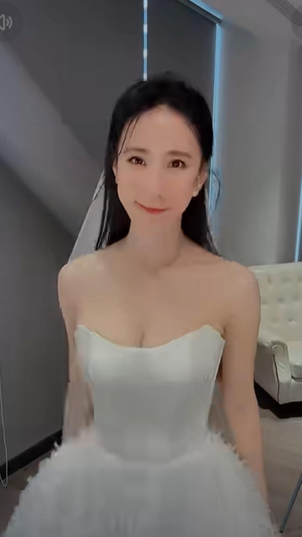 瑤瑤分享披白紗熱舞的影片。(圖/翻攝瑤瑤臉書)