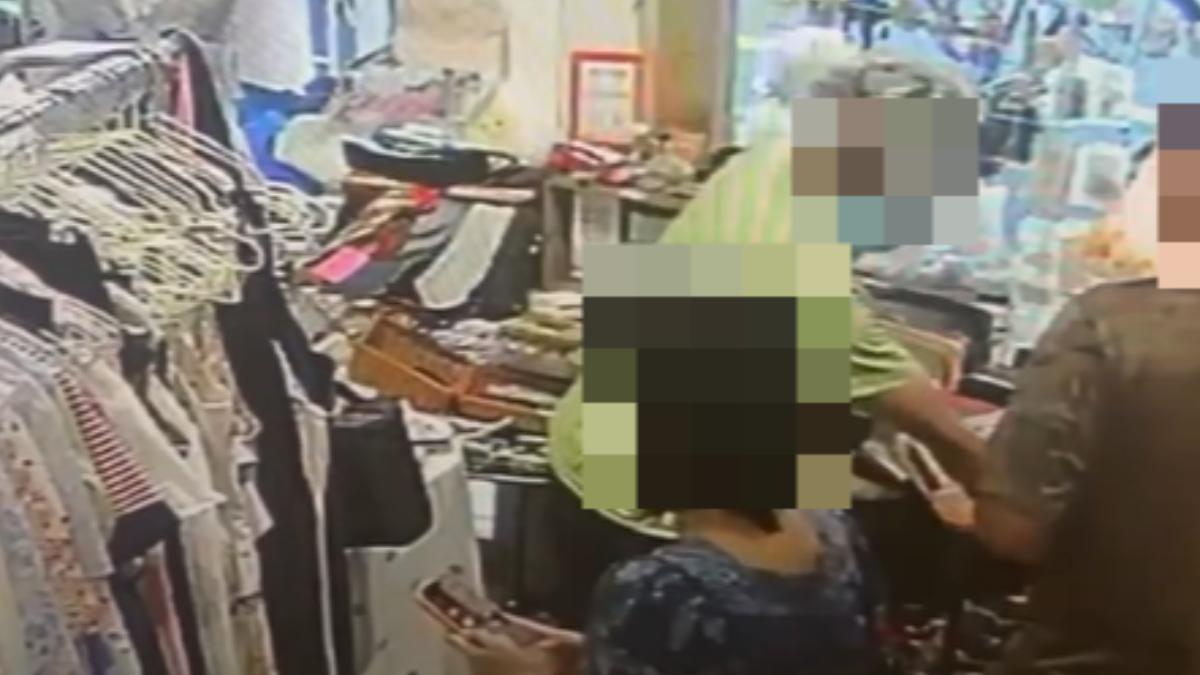 男子拿著名片走進店內，還跟店員說「沒要騷擾你」。（圖／Threads@ab0978098059