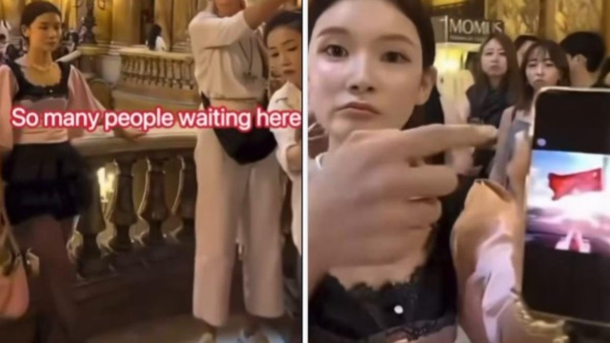 中國聾啞女在法國巴黎歌劇院秀五星旗。（圖／翻攝自 X dabowagaga）