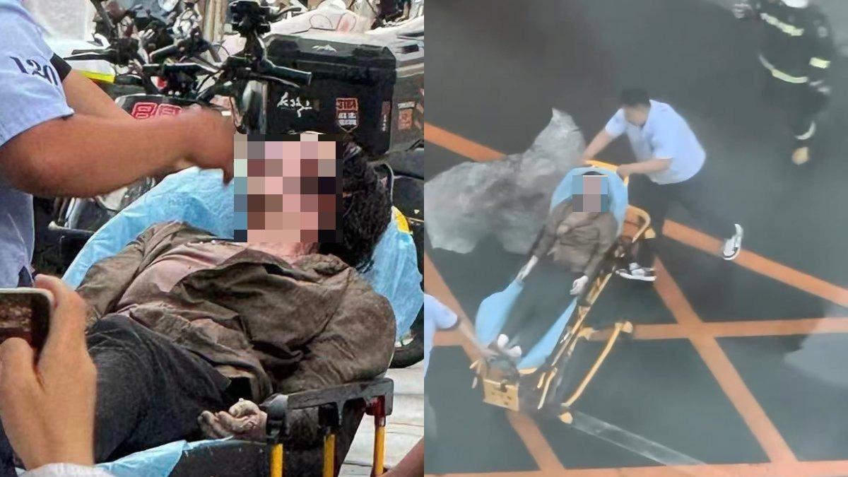 中國北京中信大廈遭小飛機撞擊,事後有一名女子受傷被抬出。(圖/翻攝自X)